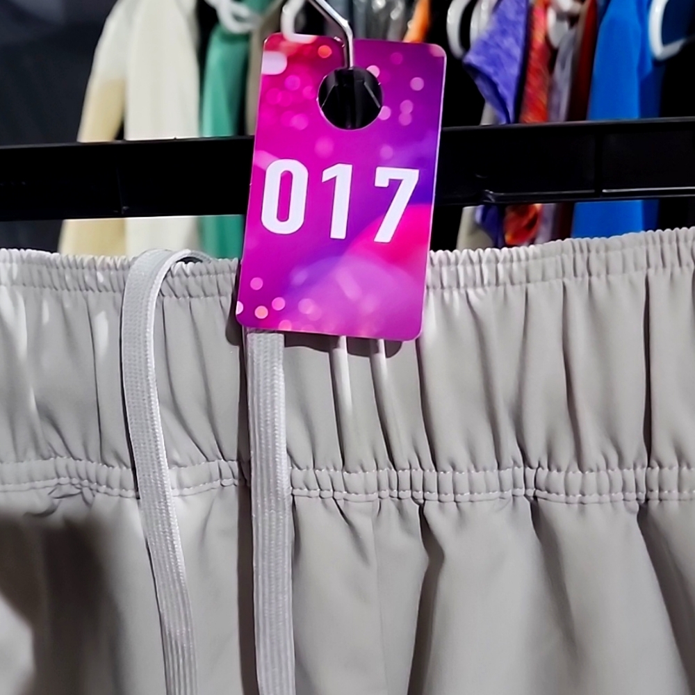 Brand new Adidas shorts with zippered pockets.